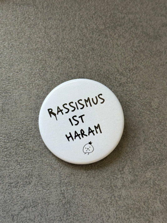Buttons „Rassismus ist Haram“